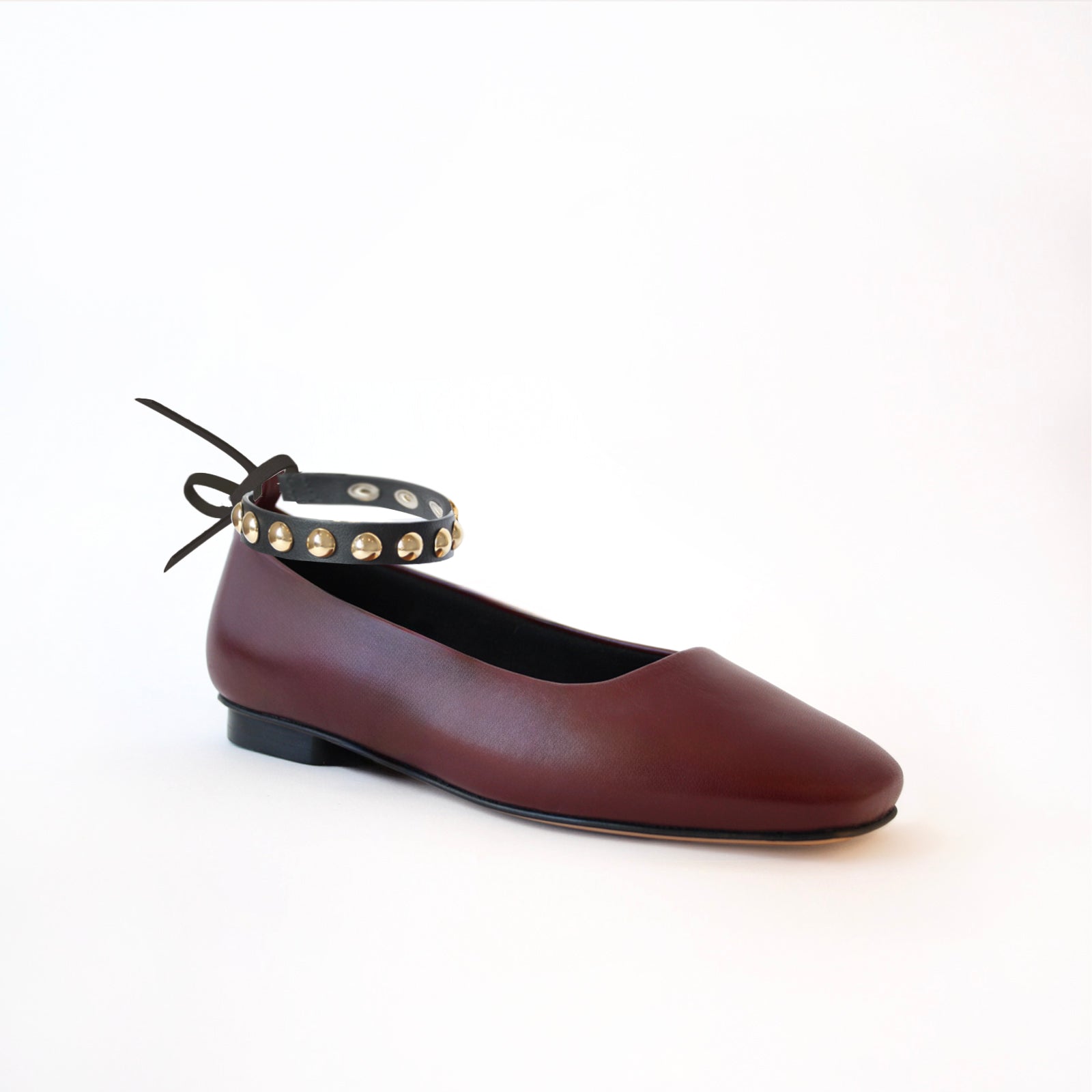 Burgundy Ballet Flats with Golden Studs Black Ankle Strap | Edgy & Versatile Camia Burgundy Ballet Flats with Golden Studs Black Ankle Strap | Edgy & Versatile Camia